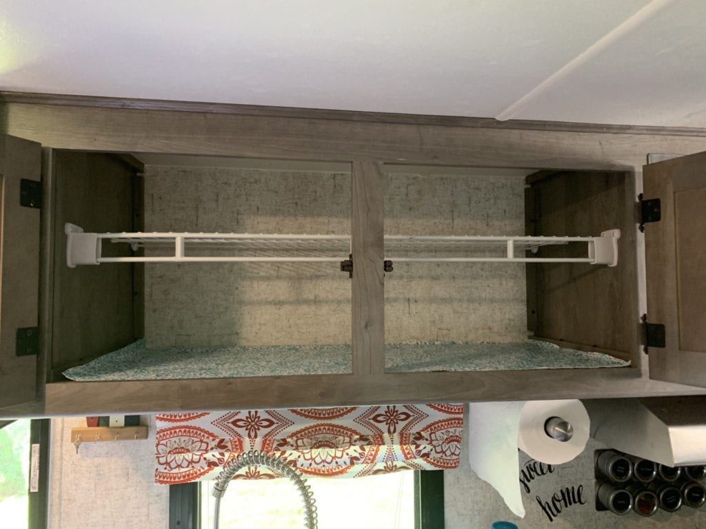 Inside of Kitchen Cabinet With Shelf Installed