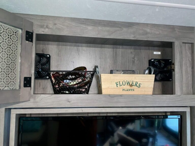 Upper Cabinet In Entertainment Center of Coachmen Apex 215RBK With Fans Installed